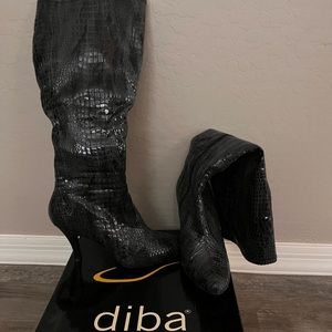 Black faux snakeskin boots.